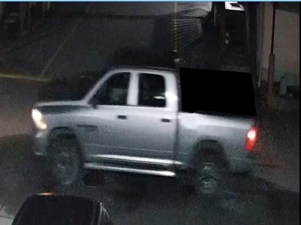 Photograph of newer model grey Dodge Ram 2500 pickup truck