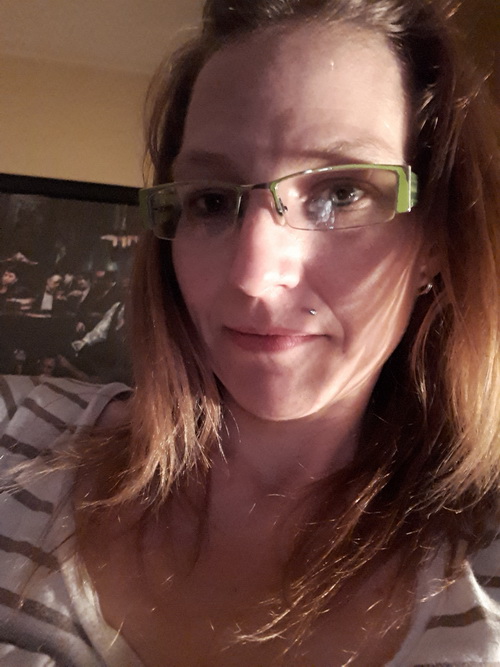 photo of missing person Nicole Bell with glasses 