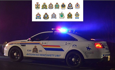 Image showing the crests of 13 police agencies and an Integrated Road Safety Unit vehicle.  Crests shown include: Abbotsford Police, Central Saanich Police, Delta Police, Metro Vancouver Transit Police, Nelson Police, New Westminster Police, Oak Bay Police, Port Moody Police, Saanich Police Dept, Vancouver Police, Victoria Police, West Vancouver Police, and the RCMP.