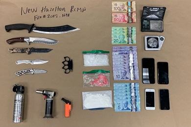 Weapons, cash suspected drugs
