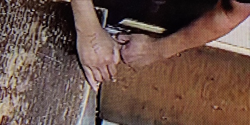 Suspects hands with possible tattoo